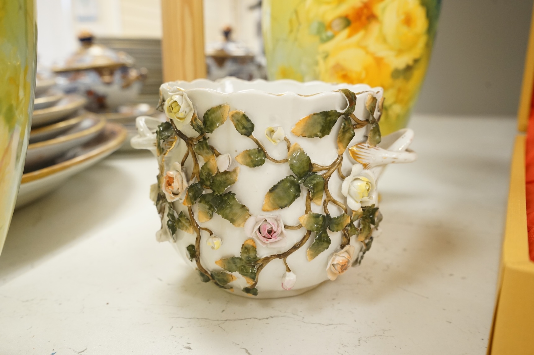 A pair of Bonn floral vases and covers, a modern Meissen vase, and an encrusted Sitzendorf vase, largest 35cm high